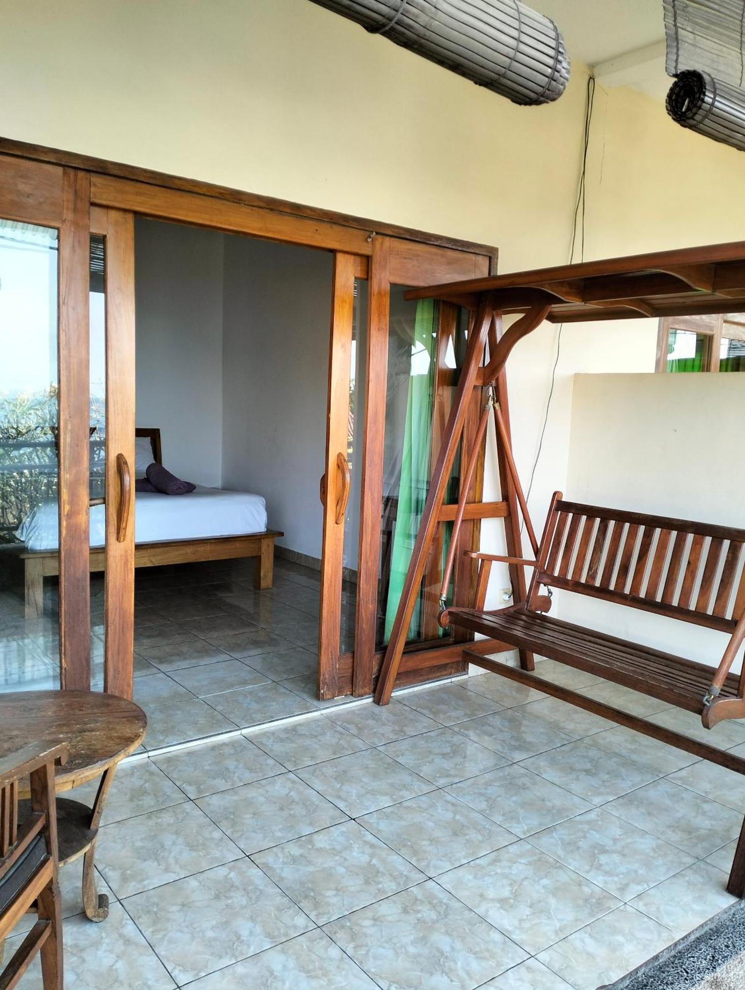 Dharma Yoga Homestay Dan Hostel アメッド エクステリア 写真