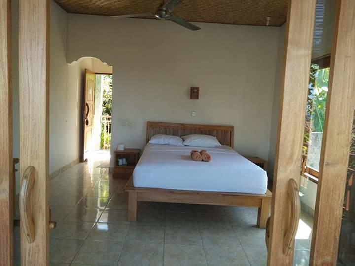 Dharma Yoga Homestay Dan Hostel アメッド エクステリア 写真
